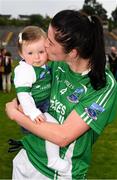 24 August 2019; Áine McGovern of Fermanagh with her daughter Cádhlá, 10 months, after the TG4 All-Ireland Ladies Football Junior Championship Semi-Final match between Fermanagh and London at St Tiernach's Park in Clones, Monaghan. Photo by Ray McManus/Sportsfile