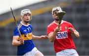 24 August 2019; Tommy O'Connell of Cork in action against Bryan O'Mara of Tipperary during the Bord Gáis Energy GAA Hurling All-Ireland U20 Championship Final match between Cork and Tipperary at LIT Gaelic Grounds in Limerick. Photo by David Fitzgerald/Sportsfile