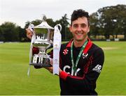 24 August 2019; Pembroke CC captain Fiachra Tucker with the trophy following his side's victory during the Clear Currency Irish Senior Cup Final match between Waringstown CC and Pembroke CC at The Hills Cricket Club in Skerries, Dublin. Photo by Seb Daly/Sportsfile