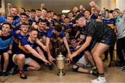 24 August 2019; Tipperary players celebrate with The James Nowlan Cup in the dressing room after the Bord Gáis Energy GAA Hurling All-Ireland U20 Championship Final match between Cork and Tipperary at LIT Gaelic Grounds in Limerick. Photo by Piaras Ó Mídheach/Sportsfile