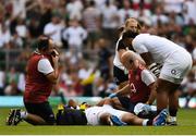 24 August 2019; Billy Vunipola of England checks on Mako Vunipola of England as he receives treatment during the Quilter International match between England and Ireland at Twickenham Stadium in London, England. Photo by Ramsey Cardy/Sportsfile