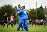 25 August 2019; Jake Donnelly of Crumlin United, hidden, is congratulated by team-mate Dean Kelly, right, and James Lee, left, after scoring his side's second goal of the game the Extra.ie FAI Cup Second Round match between Crumlin United and Lucan United at CBS Captain's Road in Crumlin, Dublin. Photo by David Fitzgerald/Sportsfile
