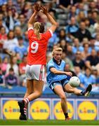 25 August 2019; Carla Rowe of Dublin scores a point despite the attention of Maire O'Callaghan of Cork during the TG4 All-Ireland Ladies Senior Football Championship Semi-Final match between Dublin and Cork at Croke Park in Dublin. Photo by Sam Barnes/Sportsfile