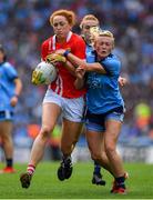25 August 2019; Niamh Cotter of Cork in action against Carla Rowe of Dublin during the TG4 All-Ireland Ladies Senior Football Championship Semi-Final match between Dublin and Cork at Croke Park in Dublin. Photo by Brendan Moran/Sportsfile