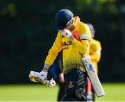 25 August 2019; Alan Reynolds of Malahide leaves the field after being caught by Chris Dougherty of CIYMS during the All-Ireland T20 Cricket Final match between CIYMS and Malahide at Stormont in Belfast. Photo by Seb Daly/Sportsfile