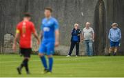 25 August 2019; Spectators look on during the Extra.ie FAI Cup Second Round match between Crumlin United and Lucan United at CBS Captain's Road in Crumlin, Dublin. Photo by David Fitzgerald/Sportsfile