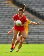 24 August 2019; Ceire Nolan of Louth in action against Cathy Carey of Antrim during the TG4 All-Ireland Ladies Football Junior Championship Semi-Final match between Louth and Antrim at St Tiernach's Park in Clones, Monaghan. Photo by Ray McManus/Sportsfile