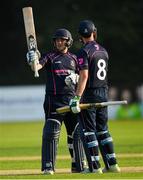 25 August 2019; John Matchett of CIYMS, left, is congratulated by team-mate Chris Dougherty after scoring a half-century during the All-Ireland T20 Cricket Final match between CIYMS and Malahide at Stormont in Belfast. Photo by Seb Daly/Sportsfile