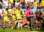 25 August 2019; Judicael Cancoriet of Clermont celebrates scoring a try with tean-mates, Faifili Levave, left, and Jacobus Van Tonder, centre, during the LNR Top 14 match between ASM Clermont Auvergne and La Rochelle at Stade Marcel-Michelin in Clermont-Ferrand, France. Photo by Romain Biard/Sportsfile