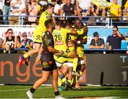 25 August 2019; Judicael Cancoriet of Clermont celebrates scoring a try with tean-mates during the LNR Top 14 match between ASM Clermont Auvergne and La Rochelle at Stade Marcel-Michelin in Clermont-Ferrand, France. Photo by Romain Biard/Sportsfile