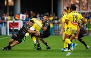 25 August 2019; Judicael Cancoriet of Clermont is tackled during the LNR Top 14 match between ASM Clermont Auvergne and La Rochelle at Stade Marcel-Michelin in Clermont-Ferrand, France. Photo by Romain Biard/Sportsfile