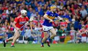 24 August 2019; Conor Bowe of Tipperary in action against Eoin Roche of Cork during the Bord Gáis Energy GAA Hurling All-Ireland U20 Championship Final match between Cork and Tipperary at LIT Gaelic Grounds in Limerick. Photo by Piaras Ó Mídheach/Sportsfile