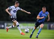 30 August 2019; Daniel Kelly of Dundalk in action against Jack Keaney of UCD during the SSE Airtricity League Premier Division match between UCD and Dundalk at The UCD Bowl in Belfield, Dublin. Photo by Ben McShane/Sportsfile