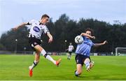 30 August 2019; Daniel Kelly of Dundalk in action against Evan Farrell of UCD during the SSE Airtricity League Premier Division match between UCD and Dundalk at The UCD Bowl in Belfield, Dublin. Photo by Ben McShane/Sportsfile