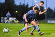 30 August 2019; Evan Farrell of UCD in action against Daniel Kelly of Dundalk during the SSE Airtricity League Premier Division match between UCD and Dundalk at The UCD Bowl in Belfield, Dublin. Photo by Ben McShane/Sportsfile