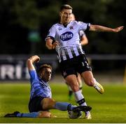30 August 2019; Patrick McEleney of Dundalk in action against Harry McEvoy of UCD during the SSE Airtricity League Premier Division match between UCD and Dundalk at The UCD Bowl in Belfield, Dublin. Photo by Ben McShane/Sportsfile