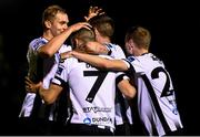 30 August 2019; Michael Duffy, 7, of Dundalk celebrates after scoring his side's third goal with team-mates during the SSE Airtricity League Premier Division match between UCD and Dundalk at The UCD Bowl in Belfield, Dublin. Photo by Ben McShane/Sportsfile