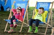 31 August 2019; Laragh Griffith, aged 7, with her brother Aaron, aged 5, from Malahide, Co. Dublin in attendance at the Electric Ireland Throwback Stage during day two of Electric Picnic 2019 at Stradbally in Laois. Electric Ireland’s Throwback Stage Nostalgic Cinema is open at Electric Picnic. As well as hosting amazing nostalgic musical acts, Electric Ireland’s Throwback Stage has your weekend matinee sorted; showing an amazing line up of retro movies during the day. This year, Electric Ireland’s Throwback Stage hosts a line-up of legends including headliners Bonnie Tyler, N-Trance, Mr. Motivator and Lords of Strut. One of the most popular stages at the festival, Electric Ireland’s Throwback Stage has previously played host to pop legends B*witched, Johnny Logan, Heather Small, 5ive, S Club Party, Ace of Base, 2 Unlimited, The Vengaboys and Bananarama – to name a few. Share in the nostalgia of the Electric Ireland Throwback Stage, visit: www.twitter.com/ElectricIreland, www.facebook.com/ElectricIreland, www.instagram.com/ElectricIreland.  #ThrowbackThrowdown. Photo by Sam Barnes/Sportsfile