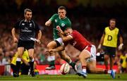 31 August 2019; Andrew Conway of Ireland is tackled by Steff Evans of Wales during the Under Armour Summer Series 2019 match between Wales and Ireland at the Principality Stadium in Cardiff, Wales. Photo by Brendan Moran/Sportsfile