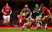 31 August 2019; Bundee Aki of Ireland is tackled by Aled Davies of Wales during the Under Armour Summer Series 2019 match between Wales and Ireland at the Principality Stadium in Cardiff, Wales. Photo by Brendan Moran/Sportsfile