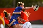 31 August 2019; Elise O’Byrne White of Leinster is tackled by Laura Sheehan and Nicole Cronin of Munster during the Women’s Interprovincial Championship match between Munster and Leinster at Irish Independent Park in Cork. Photo by Ramsey Cardy/Sportsfile