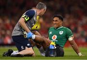 31 August 2019; Bundee Aki of Ireland is attended to by physio Keith Fox during the Under Armour Summer Series 2019 match between Wales and Ireland at the Principality Stadium in Cardiff, Wales. Photo by Brendan Moran/Sportsfile