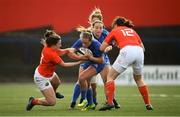 31 August 2019; Elise O’Byrne White of Leinster is tackled by Ciara Scanlan, left, and Niamh Kavanagh of Munster during the Women’s Interprovincial Championship match between Munster and Leinster at Irish Independent Park in Cork. Photo by Ramsey Cardy/Sportsfile
