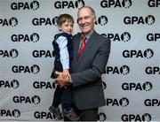 31 August 2019; Former Kerry footballer John O'Keeffe with his grandson Sean after he was presented with a lifetime achievement award for football during a GPA Football Legends Lunch at Croke Park in Dublin. Photo by Matt Browne/Sportsfile