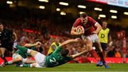 31 August 2019; Owen Lane of Wales steps inside Luke McGrath of Ireland on the way to scoring his side's first try despite the tackle of Jordi Murphy of Ireland during the Under Armour Summer Series 2019 match between Wales and Ireland at the Principality Stadium in Cardiff, Wales. Photo by Brendan Moran/Sportsfile