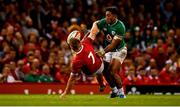 31 August 2019; James Davies of Wales is tackled by Bundee Aki of Ireland resulting in a penalty during the Under Armour Summer Series 2019 match between Wales and Ireland at the Principality Stadium in Cardiff, Wales. Photo by David Fitzgerald/Sportsfile