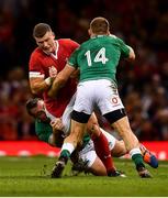 31 August 2019; Scott Williams of Wales is tackled by Andrew Conway, right, and Niall Scannell of Ireland during the Under Armour Summer Series 2019 match between Wales and Ireland at the Principality Stadium in Cardiff, Wales. Photo by David Fitzgerald/Sportsfile