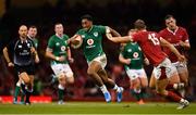 31 August 2019; Bundee Aki of Ireland in action against Hallam Amos of Wales during the Under Armour Summer Series 2019 match between Wales and Ireland at the Principality Stadium in Cardiff, Wales. Photo by Brendan Moran/Sportsfile
