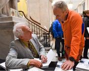 31 August 2019; Author Iain Maclean, left, signs copies of The Liffey Descent for guests during its launch at City Hall in Dublin. Photo by Seb Daly/Sportsfile