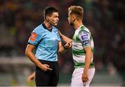 30 August 2019; Referee Robert Hennessy and Greg Bolger of Shamrock Rovers during the SSE Airtricity League Premier Division match between Shamrock Rovers and Bohemians at Tallaght Stadium in Dublin. Photo by Stephen McCarthy/Sportsfile