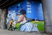 1 September 2019; Ruairí O'Byrne of featurewalls.ie puts the finishing touches to a mural in Ballybough close to Croke Park before the GAA Football All-Ireland Senior Championship Final match between Dublin and Kerry at Croke Park in Dublin. Photo by Piaras Ó Mídheach/Sportsfile