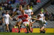 1 September 2019; Jack Cahalane of Cork has a shot on goal under pressure from Kyle O’Neill of Galway during the Electric Ireland GAA Football All-Ireland Minor Championship Final match between Cork and Galway at Croke Park in Dublin. Photo by Harry Murphy/Sportsfile