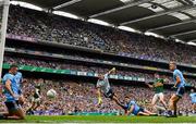 1 September 2019; Paul Geaney of Kerry watches a shot at goal despite the attention of Dublin players, from left, James McCarthy, Stephen Cluxton, David Byrne and Jonny Cooper during the GAA Football All-Ireland Senior Championship Final match between Dublin and Kerry at Croke Park in Dublin. Photo by Ramsey Cardy/Sportsfile