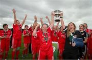 1 September 2019; TEK United joint captains Niamh Carroll Left, and  Catherine Meeney lifts the Cup following the FAI Women's Intermediate Cup Final match between Wilton United and TEK United at St Kevin's FC, Newhill Park in Two Mile Borris, Tipperary. Photo by Michael P Ryan/Sportsfile