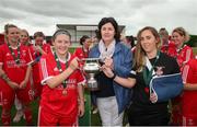 1 September 2019; Chairperson of the FAI women's committee Frances Smith presents the Cup to TEK United captains Niamh Carroll Left and Catherine Meeney following the FAI Women’s Intermediate Cup Final match between Wilton United and TEK United at St Kevin’s FC, Newhill Park in Two Mile Borris, Tipperary. Photo by Michael P Ryan/Sportsfile