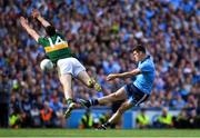 1 September 2019; Diarmuid Connolly of Dublin kicks a wide late in the second half under pressure from Paul Geaney of Kerry during the GAA Football All-Ireland Senior Championship Final match between Dublin and Kerry at Croke Park in Dublin. Photo by Piaras Ó Mídheach/Sportsfile
