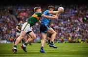 1 September 2019; David Byrne of Dublin in action against Tommy Walsh of Kerry during the GAA Football All-Ireland Senior Championship Final match between Dublin and Kerry at Croke Park in Dublin. Photo by Stephen McCarthy/Sportsfile