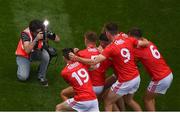 1 September 2019; Cork players celebrate for Sportsfile photographer Harry Murphy following the final whistle of the Electric Ireland GAA Football All-Ireland Minor Championship Final match between Cork and Galway at Croke Park in Dublin. Photo by Stephen McCarthy/Sportsfile