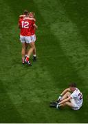 1 September 2019; Cork players, Eoghan Nash, 12, and Sean Andrews of Cork celebrate as Conall Gallagher of Galway reacts following the final whistle of the Electric Ireland GAA Football All-Ireland Minor Championship Final match between Cork and Galway at Croke Park in Dublin. Photo by Stephen McCarthy/Sportsfile