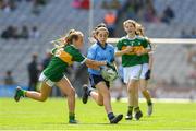 1 September 2019; Eimear Igoe, St. Teresa’s NS, Clontumpher, Ballinalee, Longford, representing Dublin, in action against Blathnaid McCarthy, Carrick PS, Burren, Down, representing Kerry, during the INTO Cumann na mBunscol GAA Respect Exhibition Go Games at the GAA Football All-Ireland Senior Championship Final match between Dublin and Kerry at Croke Park in Dublin. Photo by Eóin Noonan/Sportsfile