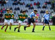 1 September 2019; Denjoe O'Riordan, Glantane NS, Mallow, Cork, representing Dublin, with Diarmuid McMahon, Lissycasey NS, Ennis, Clare, representing Kerry, and Michael Duffy, St. Patrick’s PS, Derrygonnelly, Fermanagh, representing Kerry,left,  during the INTO Cumann na mBunscol GAA Respect Exhibition Go Games at the GAA Football All-Ireland Senior Championship Final match between Dublin and Kerry at Croke Park in Dublin. Photo by Ray McManus/Sportsfile