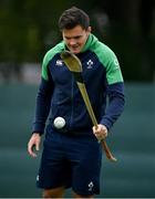 3 September 2019; Jacob Stockdale with a hurley and sliotar during Ireland Rugby squad training at Carton House in Maynooth, Co. Kildare. Photo by Brendan Moran/Sportsfile