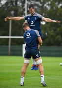 3 September 2019; Jonathan Sexton is lifted by Josh van der Flier during Ireland Rugby squad training at Carton House in Maynooth, Co. Kildare. Photo by Brendan Moran/Sportsfile