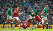 7 September 2019; Bundee Aki of Ireland is tackled by Rhys Patchell, left, and Hadleigh Parkes of Wales during the Guinness Summer Series match between Ireland and Wales at Aviva Stadium in Dublin. Photo by Ramsey Cardy/Sportsfile