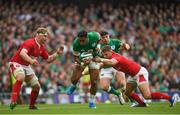 7 September 2019; Bundee Aki of Ireland is tackled by Dan Biggar of Wales during the Guinness Summer Series match between Ireland and Wales at the Aviva Stadium in Dublin. Photo by Ramsey Cardy/Sportsfile
