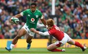 7 September 2019; Bundee Aki of Ireland is tackled by Rhys Patchell of Wales during the Guinness Summer Series match between Ireland and Wales at the Aviva Stadium in Dublin. Photo by Ramsey Cardy/Sportsfile